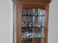 Crystal Display Cabinet  When my wife's mother died, she left a large collection of Swarovski crystal. The collection sat in storage for a few years until my wife Patty saw this display case in Wood Magazine. Now the crystal collection is on display.