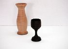 Turned Vase and Goblet  These represent a couple of my attempts to develop a new skill - turning on a lathe. The vase is curly Maple; the goblet is made from Wenge.