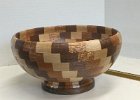 Tornado Bowl  Another segmented bowl called a "Tornado Bowl" because the wood colors spiral around. Uses Maple, Walnut, and Mahogany.